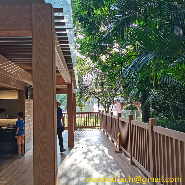 Composite wood deck railing installed beside public toilets