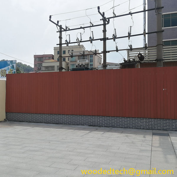 Huangge Town roadside transformer decorated by wpc vertical cladding