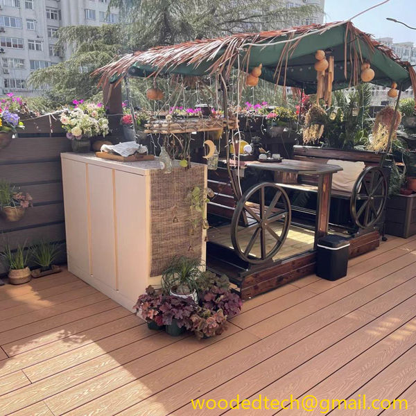 The top floor resident’s large balcony is paved with decking wpc outdoor