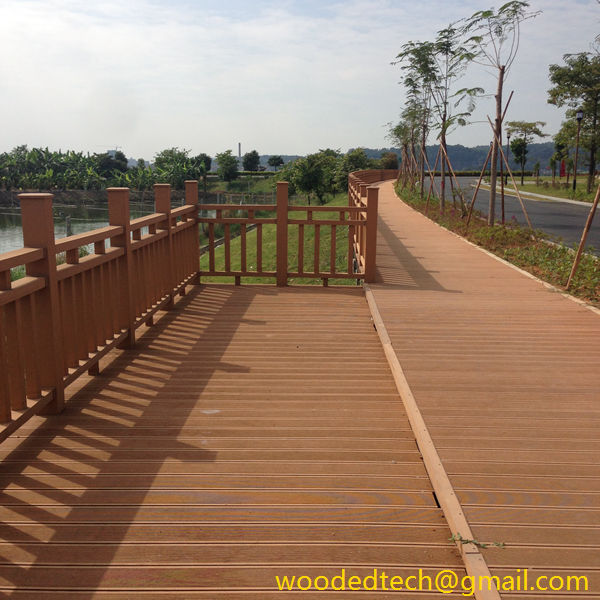 WPC decking as boardwalk floor and fence at seaside tourist resort