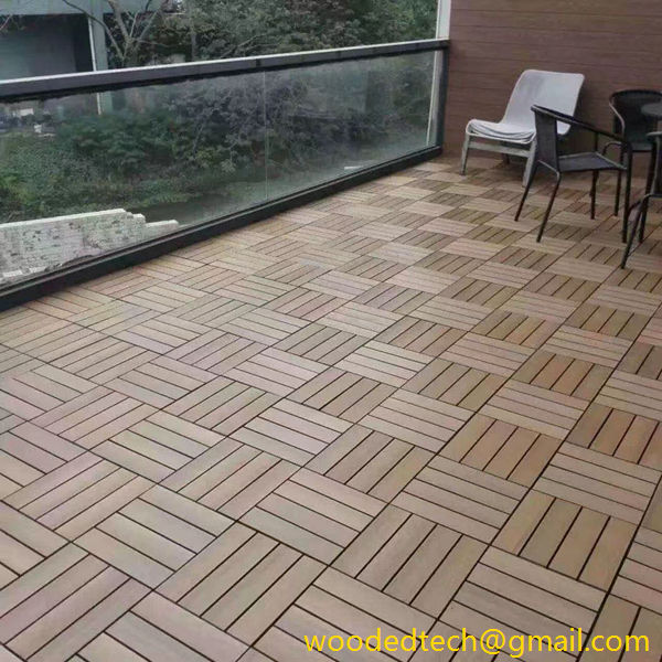 WPC decking floor tiles paved on the large balcony outside the second floor of the villa