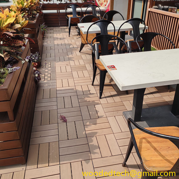 WPC decking tiles installed outside shops in Jiaomen River, Nansha, Guangzhou