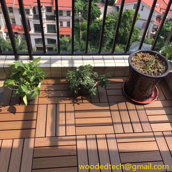 Wooden composite decking tiles laid on urban residential balconies