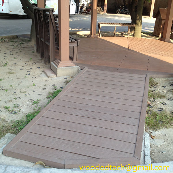 composite decking wpc as leisure floor and decorative pergola in the park