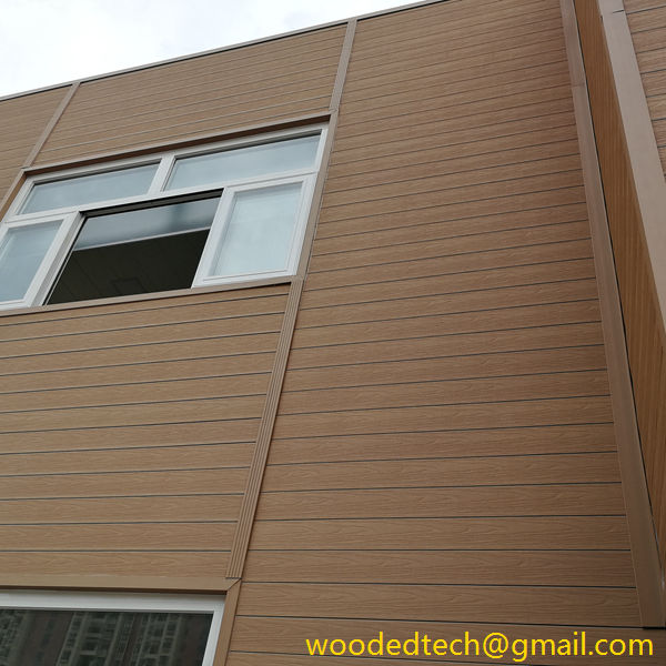 wpc wall panel cladding installed on the exterior wall of an office building