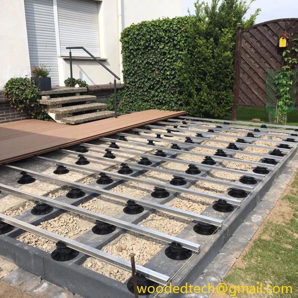 Adjustable supports for decking is a good helper for garden floor installation