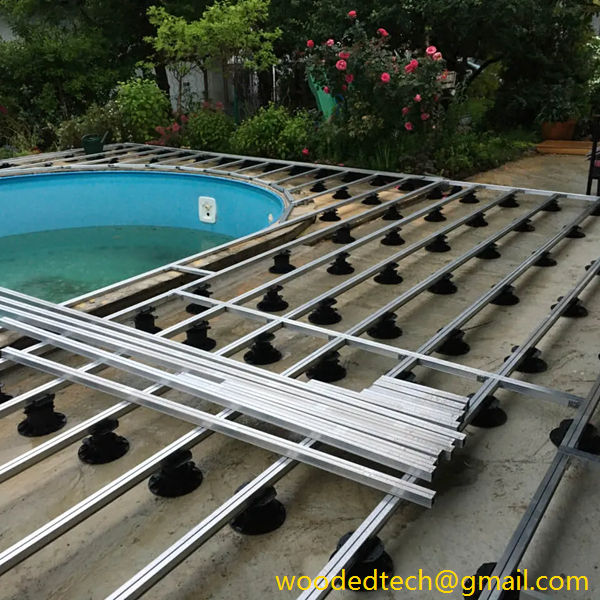 Height adjustable elevated post support for swimming pool floor