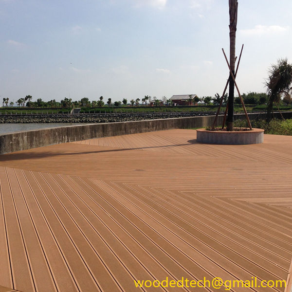 Recycled plastic decking boards installed at cross angles