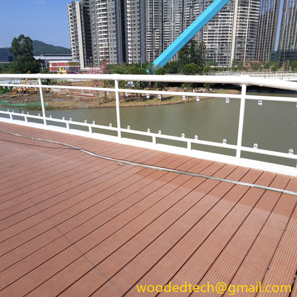 The entire pedestrian bridge is paved with 10′ composite decking