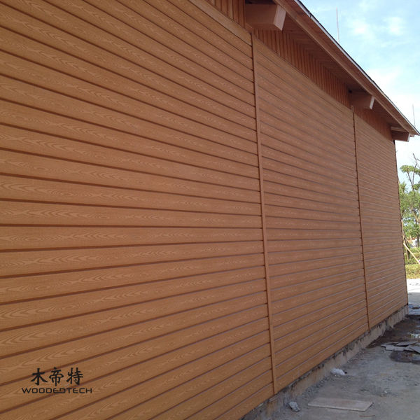 Composite wood polymer treillage wall panels for modern landscape privacy solutions